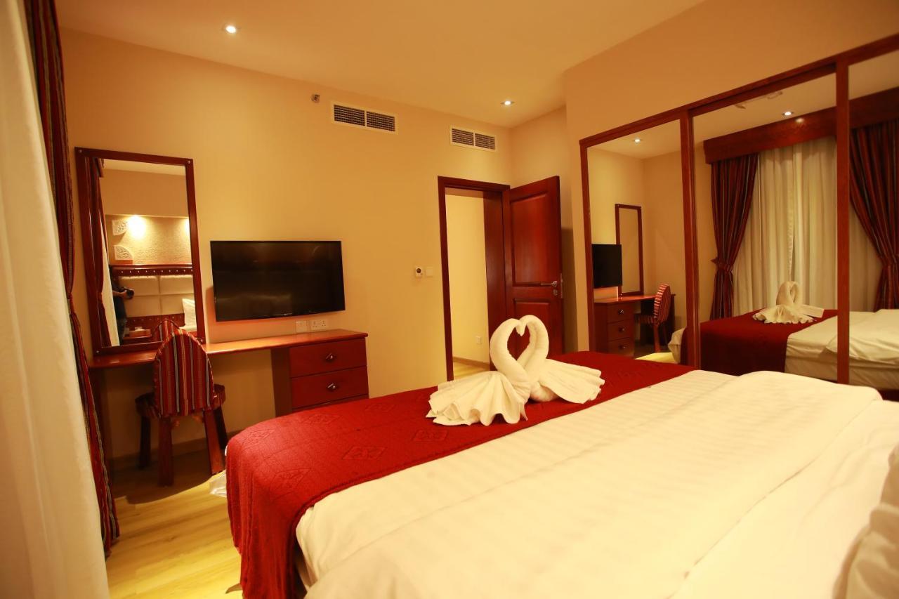 อัล ลิวาน สวีทส์ รอว์ดาต อัล ไคล Aparthotel โดฮา ภายนอก รูปภาพ
