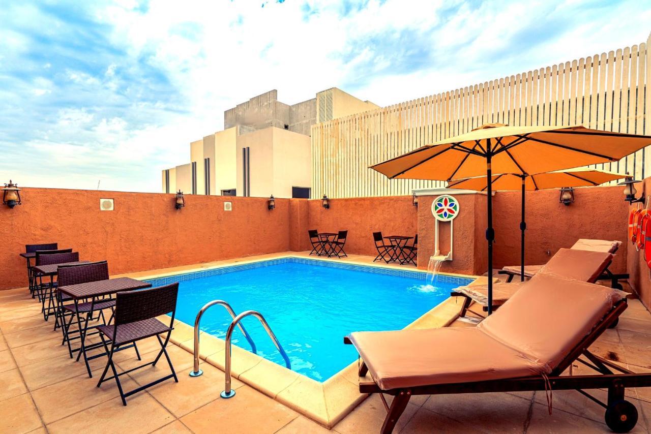 อัล ลิวาน สวีทส์ รอว์ดาต อัล ไคล Aparthotel โดฮา ภายนอก รูปภาพ